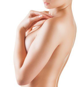 woman covering breasts
